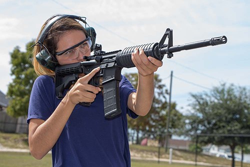 Girl Shooting AR-15 Rifle